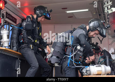 London, UK.  13 June 2019. (L to R) Alex Wilson and Sam Rogers from Gravity Industries prepare to preview their Race Series concept at Royal Victoria Docks, East London, during London Tech Week 2019, ahead of the launch of Gravity Industries’ International Race Series in early 2020.  Gravity Industries are the designers, builders and pilots of the world’s first patented Jet Suit, pioneering a new era of human flight. Credit: Stephen Chung / Alamy Live News