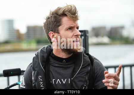 London, UK.  13 June 2019.  Richard Browning the Founder and Chief Test Pilot of Gravity Industries and ‘real life Iron Man’ previews their Race Series concept at Royal Victoria Docks, East London, during London Tech Week 2019, ahead of the launch of Gravity Industries’ International Race Series in early 2020.  Gravity Industries are the designers, builders and pilots of the world’s first patented Jet Suit, pioneering a new era of human flight. Credit: Stephen Chung / Alamy Live News