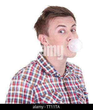 Young man blowing bubble of chewing gum isolated on white Stock Photo