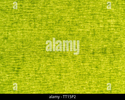 background from yellow green chartreuse color corrugated paper close up Stock Photo