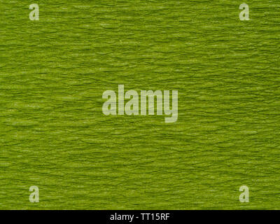 background from dark green chartreuse color corrugated paper close up Stock Photo