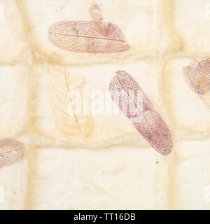 square background from handmade organic paper with purple leaves close up Stock Photo