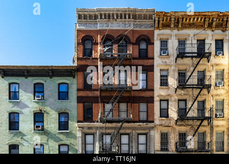 Block of colorful old buildings with clear blue sky background in the Upper East Side of Manhattan New York City NYC Stock Photo