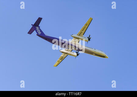 LONDON HEATHROW AIRPORT, ENGLAND - MARCH 2019:  De Havilland Canada DHC-8-402Q Dash 8 turboprop aircraft operated by Flybe Stock Photo
