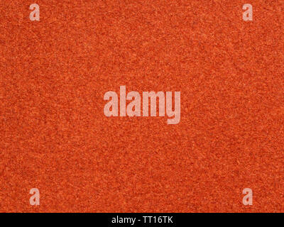 background from brown orange velvet flock paper close up Stock Photo