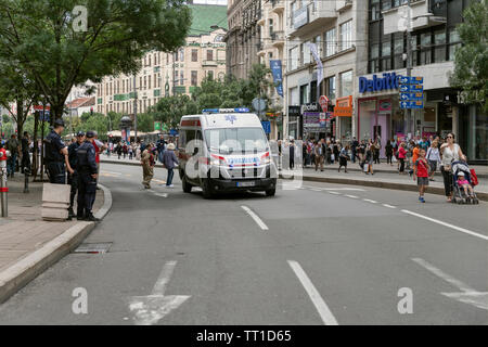 Belgrade, Serbia, June 6th 2019: An ambulance van following procession honoring the city holiday Savors Day (Spasovdan) at the Terazije Square Stock Photo