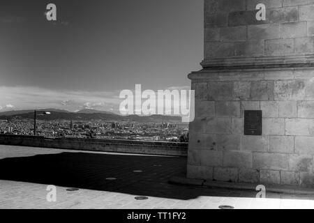 Stunning view of Barcelona, shot taken a few steps from the watchtower of the castle located on the Montjuic hill,  horizontal composition, black and Stock Photo