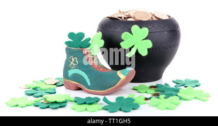 Saint Patrick day boot, pot of gold coins and clover leaves, isolated on white Stock Photo