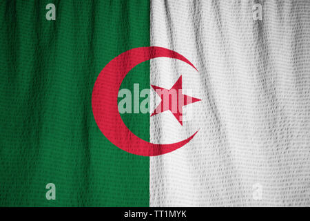 Ruffled Flag of Algeria Blowing in Wind Stock Photo