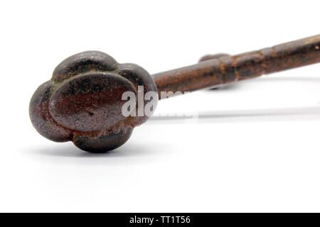 Golden wall hanger isolated on a white background, close-up Stock Photo