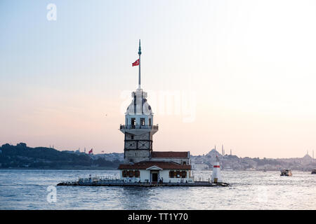 Sunset at Maiden's Tower in Istanbul, Turkey. This tower known as 'Kiz Kulesi' in Turkish Stock Photo