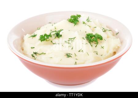 Delicious mashed potatoes with greens in bowl isolated on white Stock Photo