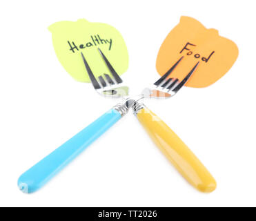 Note papers with messages attached to forks, isolated on white Stock Photo