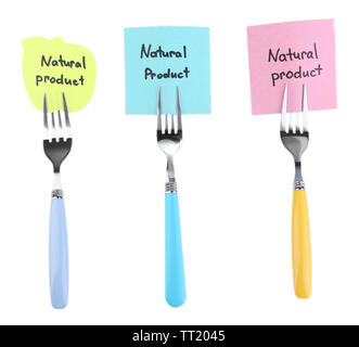 Note papers with messages  attached to forks, isolated on white Stock Photo