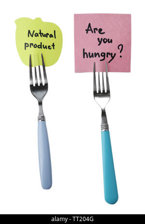 Note papers with messages  attached to forks, isolated on white Stock Photo