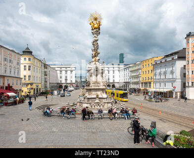 LInz Main Square Hauptplatz with Plague Column Pestsäule or Dreifaltigkeitssäule Holy Trinity Column. Linz Austria Stock Photo