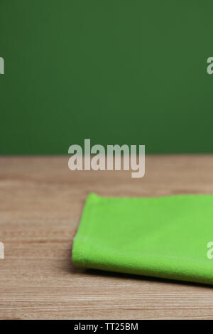 Background with wooden table and tablecloth Stock Photo