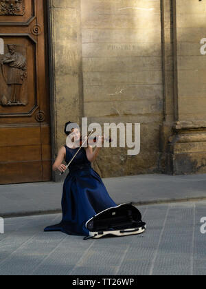 Beautiful street musician in Florence, Italy. Stock Photo