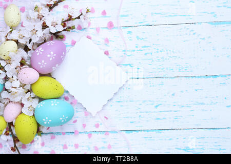 Easter composition with flowering branches on wooden table close-up Stock Photo