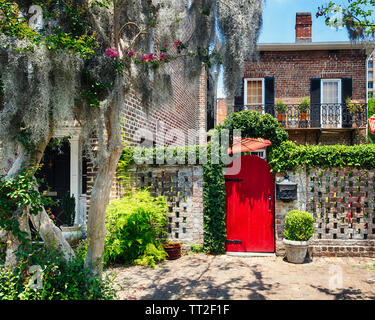 Downtown Street Scene with a Red Door and Historic House, Savannah, Georgia Stock Photo