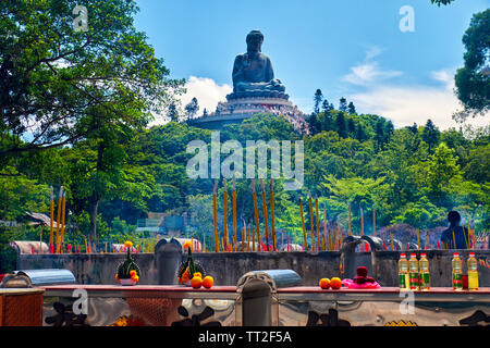 Low Angle View of the Tian Tan Buddha Statue with Offerings, Lantau, Hong Kong Stock Photo