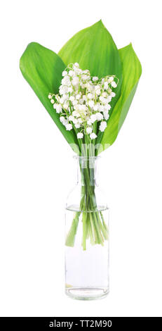 Beautiful lilies of the valley in glass bottle, isolated on white Stock Photo