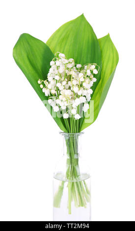 Beautiful lilies of the valley in glass bottle, isolated on white Stock Photo