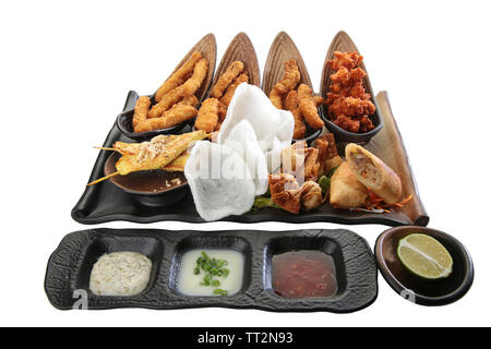 appetizer combo plate with various sauces white background Stock Photo