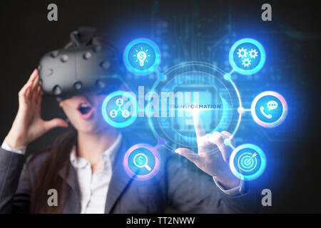 The concept of business, technology, the Internet and the network. A young entrepreneur working on a virtual screen of the future and sees the inscrip Stock Photo