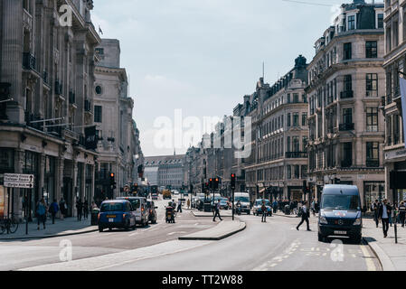 London, UK - May 15, 2019: Busy London street scene on Regent St. Regent Street is a major shopping street in the West End of London famous for the lu Stock Photo