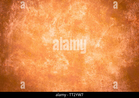 Abstract, vignette orange concrete background. The texture of the concrete wall. Stock Photo