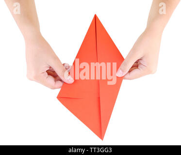 Hands making origami rabbit, close up, isolated on white Stock Photo