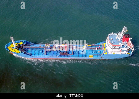 Large crude oil tanker roaring across The Mediterranean sea - Aerial image. Stock Photo