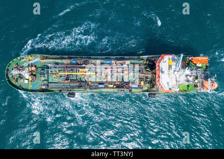 Large crude oil tanker roaring across The Mediterranean sea - Aerial image. Stock Photo