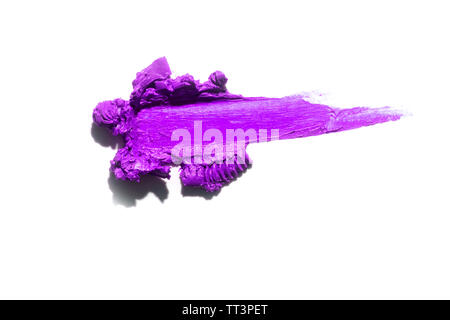 Eye shadow or bronzer purple smudge isolated on white background. Stock Photo