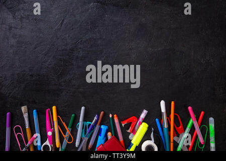 Back to school. Items for the school on a black background Stock Photo