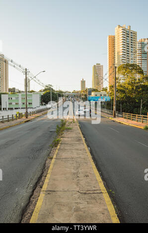 Campo Grande - MS, Brazil - June 10, 2019: Transit on a ordinary day at Ceara avenue, one of the main streets of the city. Photo in the middle of the Stock Photo