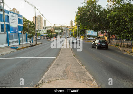 Campo Grande - MS, Brazil - June 10, 2019: Transit on a ordinary day at Ceara avenue, one of the main streets of the city, close to Uniderp university Stock Photo