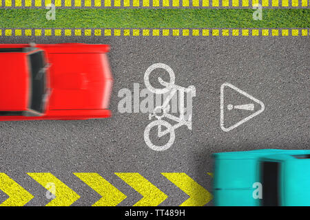 Road traffic offense. Driving by bicycle lane. Concept of biking safety. Top view on road with bike path sign and marks and moving blurred cars on it Stock Photo