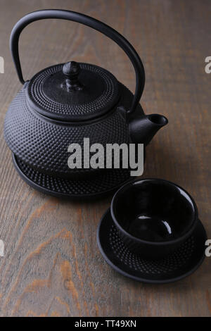 Chinese traditional teapot on wooden background Stock Photo