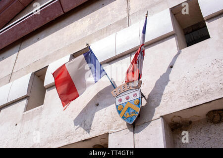 French Tricolor flags fly outside of Gare Marne-La-Vallee Chessy. Lewis Mitchell. Stock Photo
