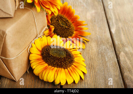 Sunflowers with present boxes on wooden background Stock Photo Alamy