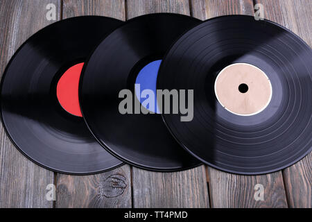 Records on paper bags on wooden background Stock Photo