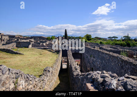 Ruins in the archaeological excavations of the ancient Roman town of Pompeii in Campania near Naples in Southern Italy Stock Photo