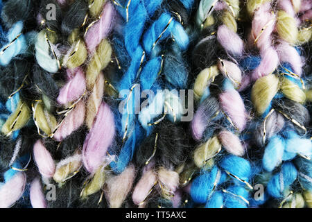 Pink, gray, multicolored yarn of wool in bundles for hand knitting,  hand-painted in beautiful colors Stock Photo - Alamy