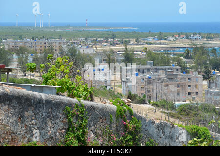 Derelict buildings and concrete apartment blocks in Gibara, Southern Cuba Stock Photo