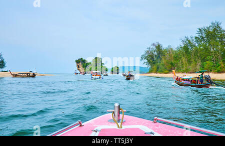 AO NANG, THAILAND - APRIL 27, 2019: The speed-boat tour starts from the Klong Son canal harbor, surrounded by tiny rocky islets and coast of Noppharat Stock Photo
