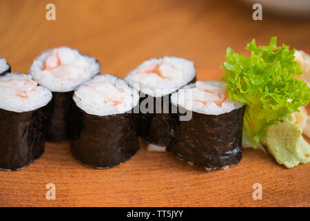 Close up of sushi rolls, California and traditional style sushi rolls Stock Photo
