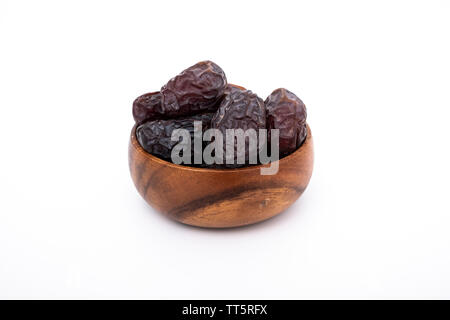 Close up macro photo of dates fruit, date fruits on isolated white Stock Photo