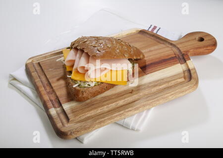 rye bread smoked meat chicken sandwich with cheese Stock Photo